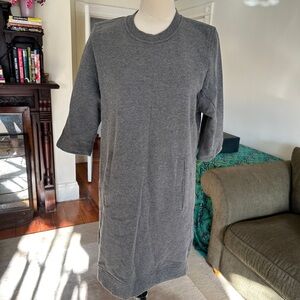 Fabletics long / dress sweatshirt. Never worn. Zippers on both sides. Size M.